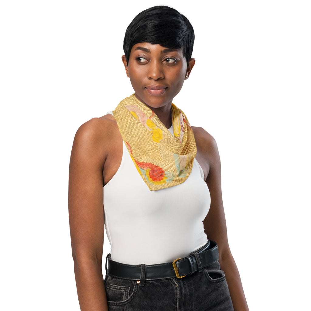 Model in a white tank top and black belt wearing the gold floral bandana knotted around the neck