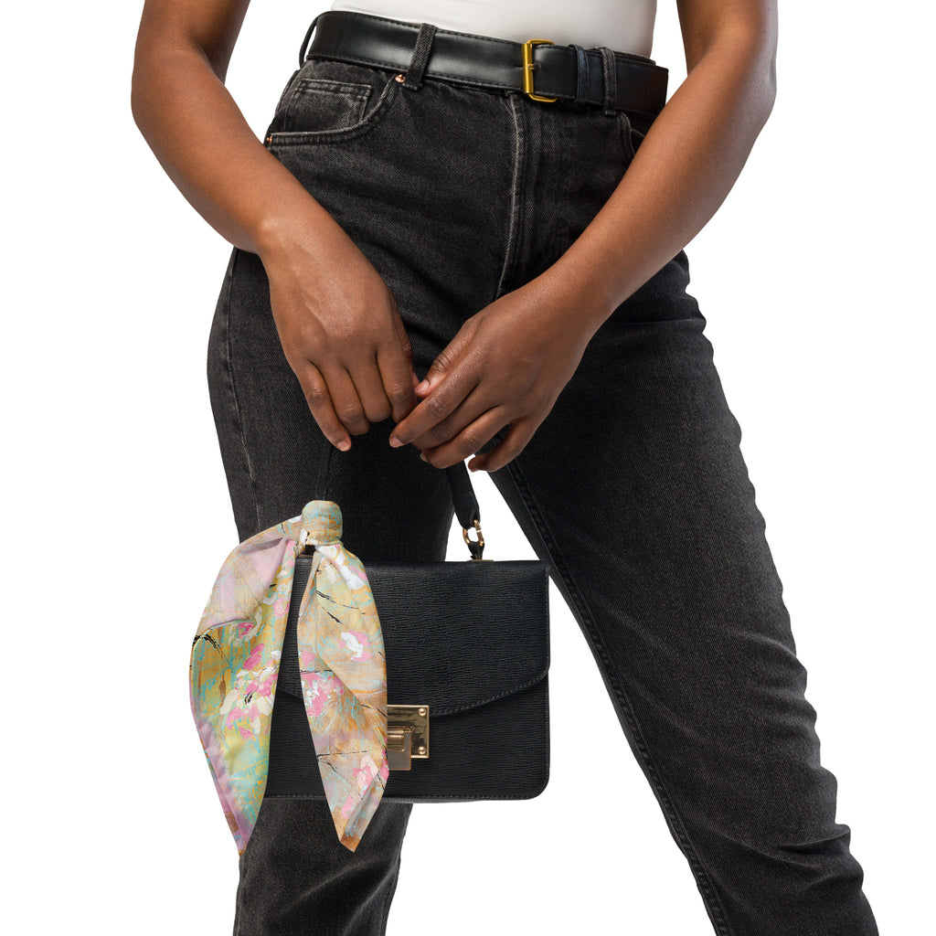THE LIGHT OF FLOWERS II art bandana – tied as a bow on a handbag handle