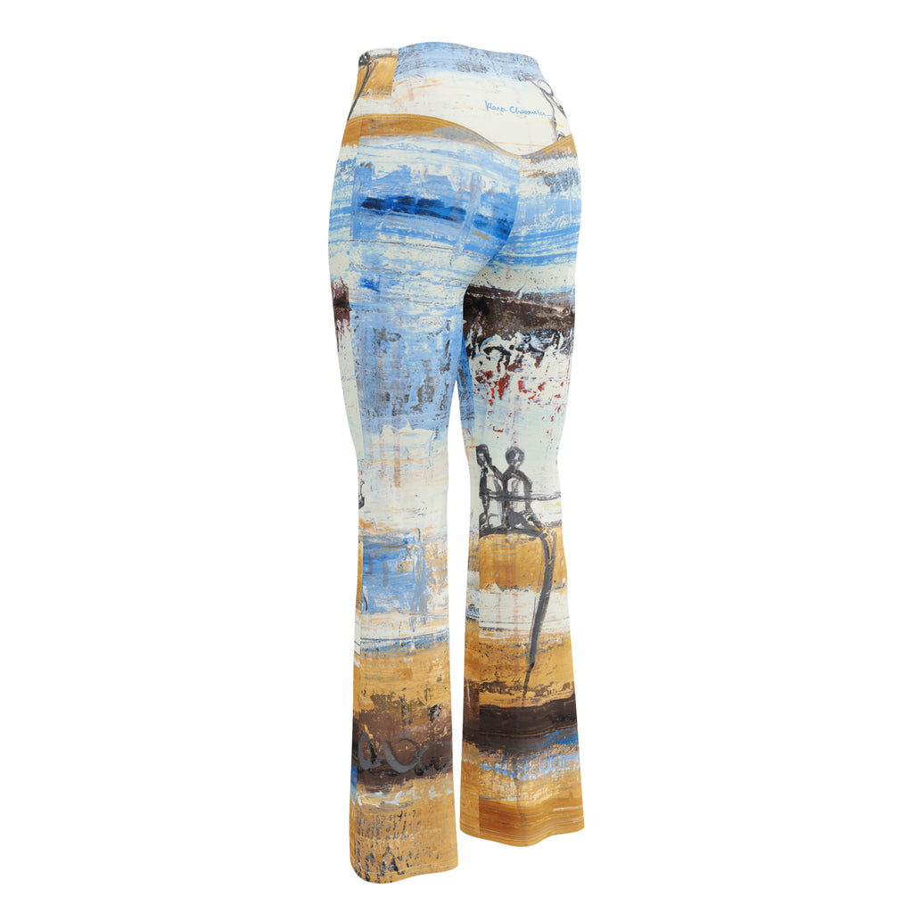 3D back view of flare leggings in sky blue, cream and ochre bands with a small blue signature