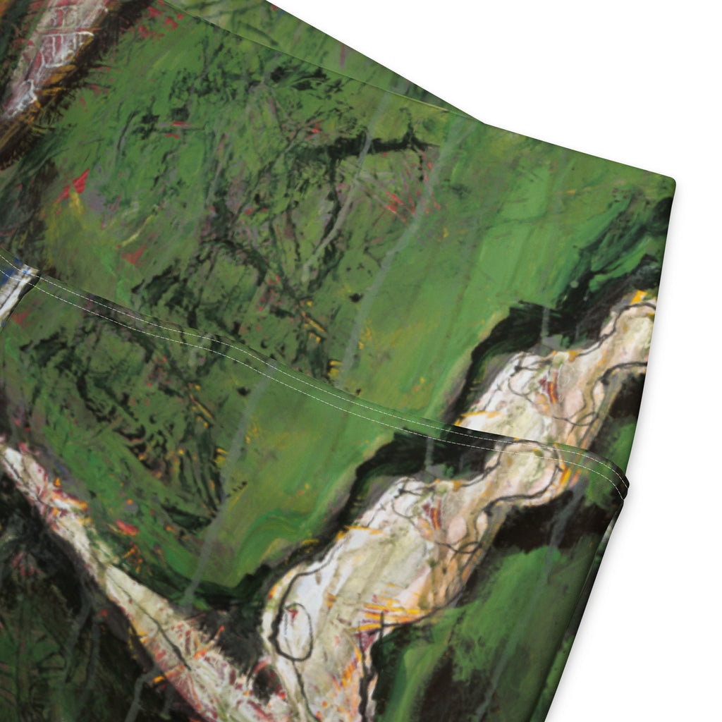 Close-up of the high waistband seam over green brushstrokes and a pale figure with red and gold accents