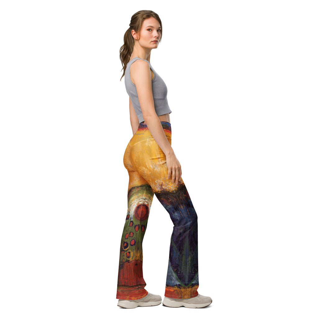 Model looking over her shoulder, leggings with red dotted circles on a green leg