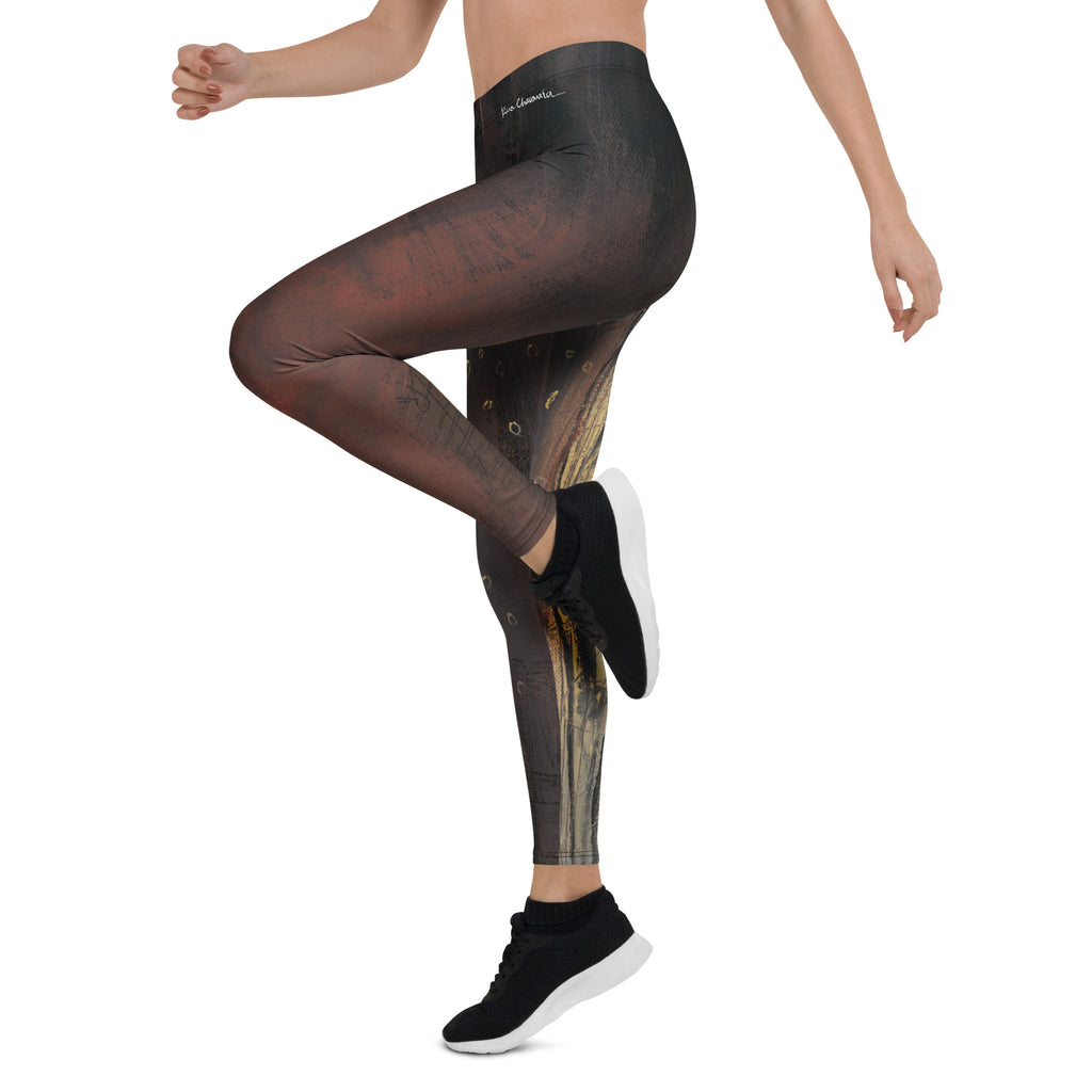 Model lifting one knee mid-step, rust thigh and white signature at the waistband
