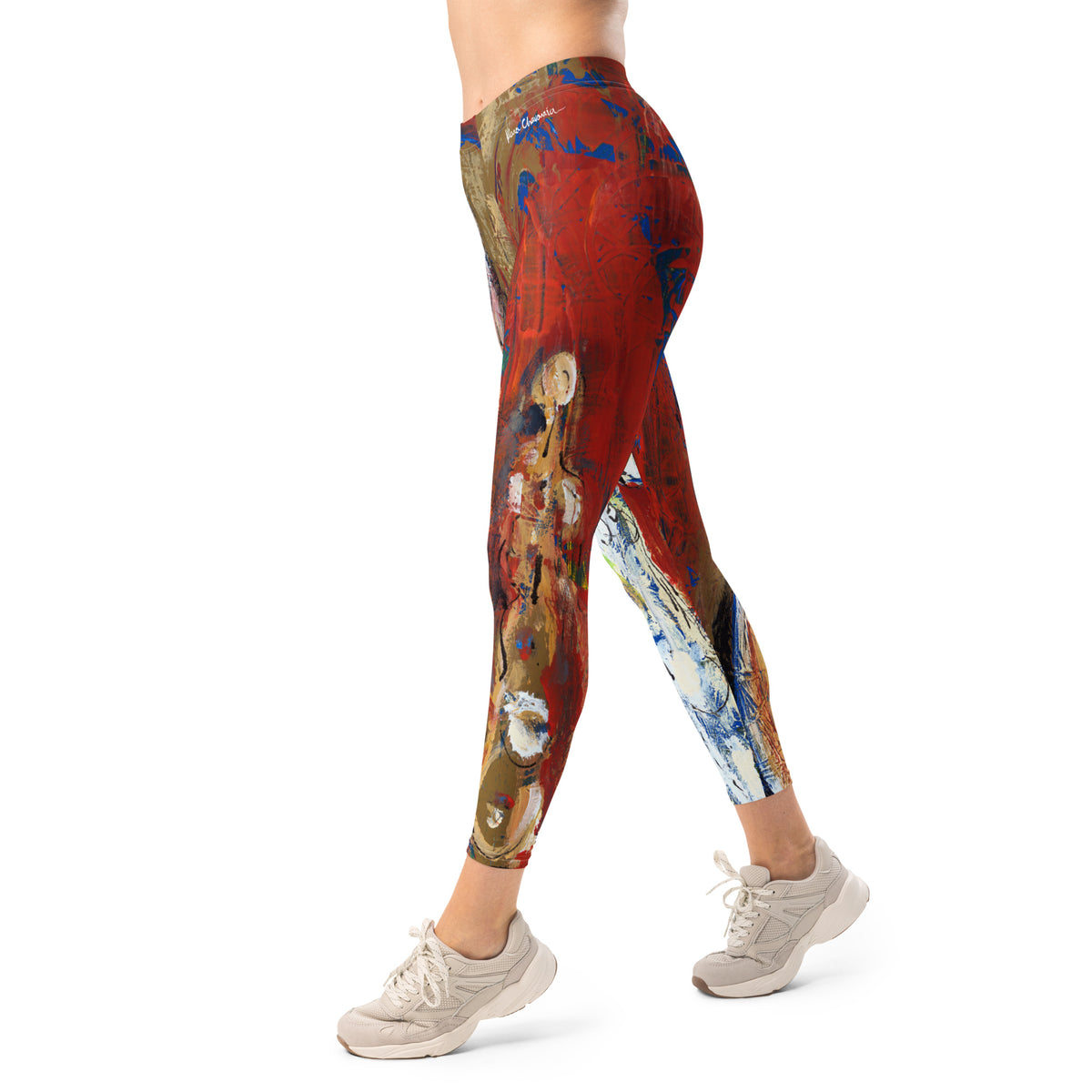 Side view of model in sneakers mid-stride, tan figure on the thigh and white lower leg