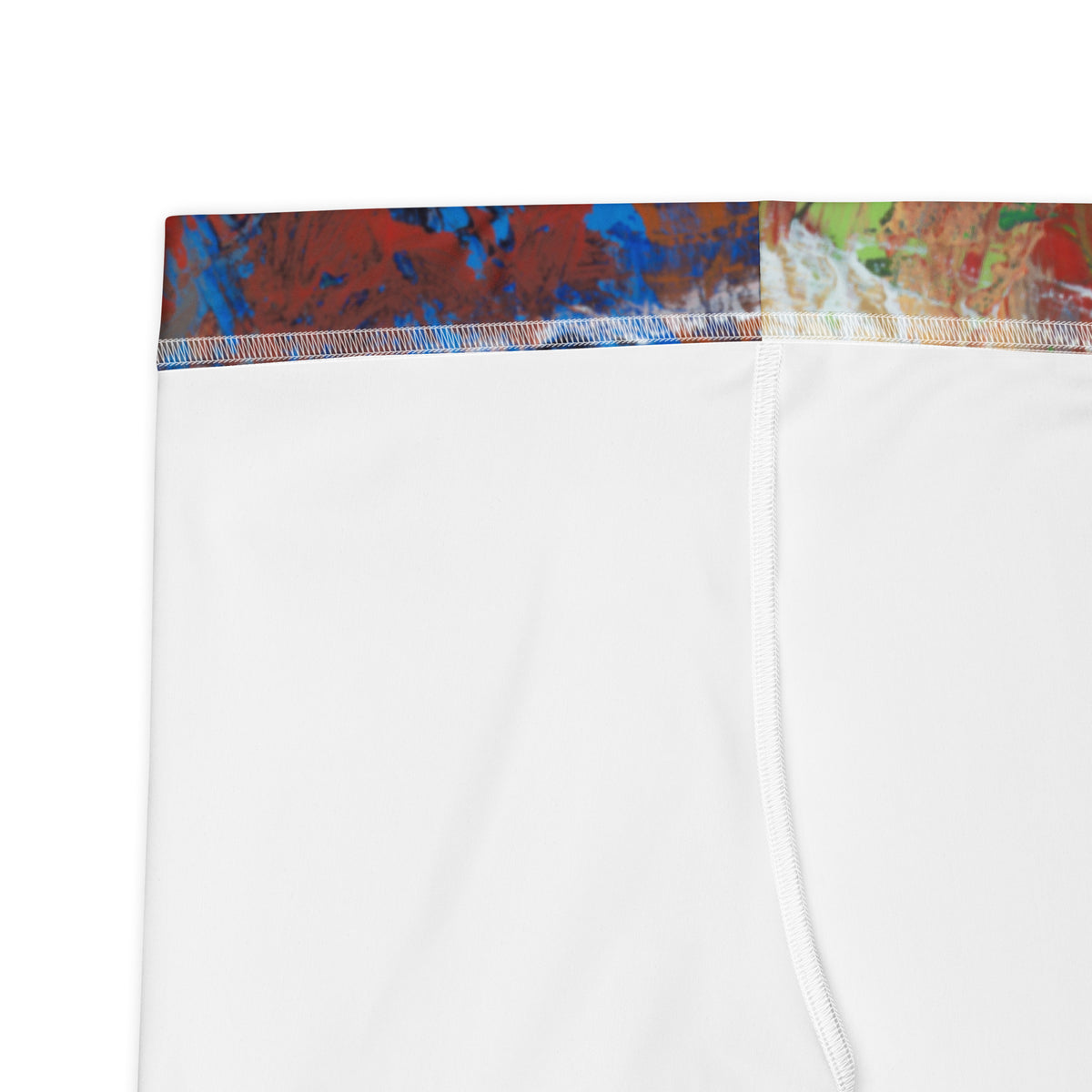 Close-up of white inner lining with a red and blue printed waistband edge