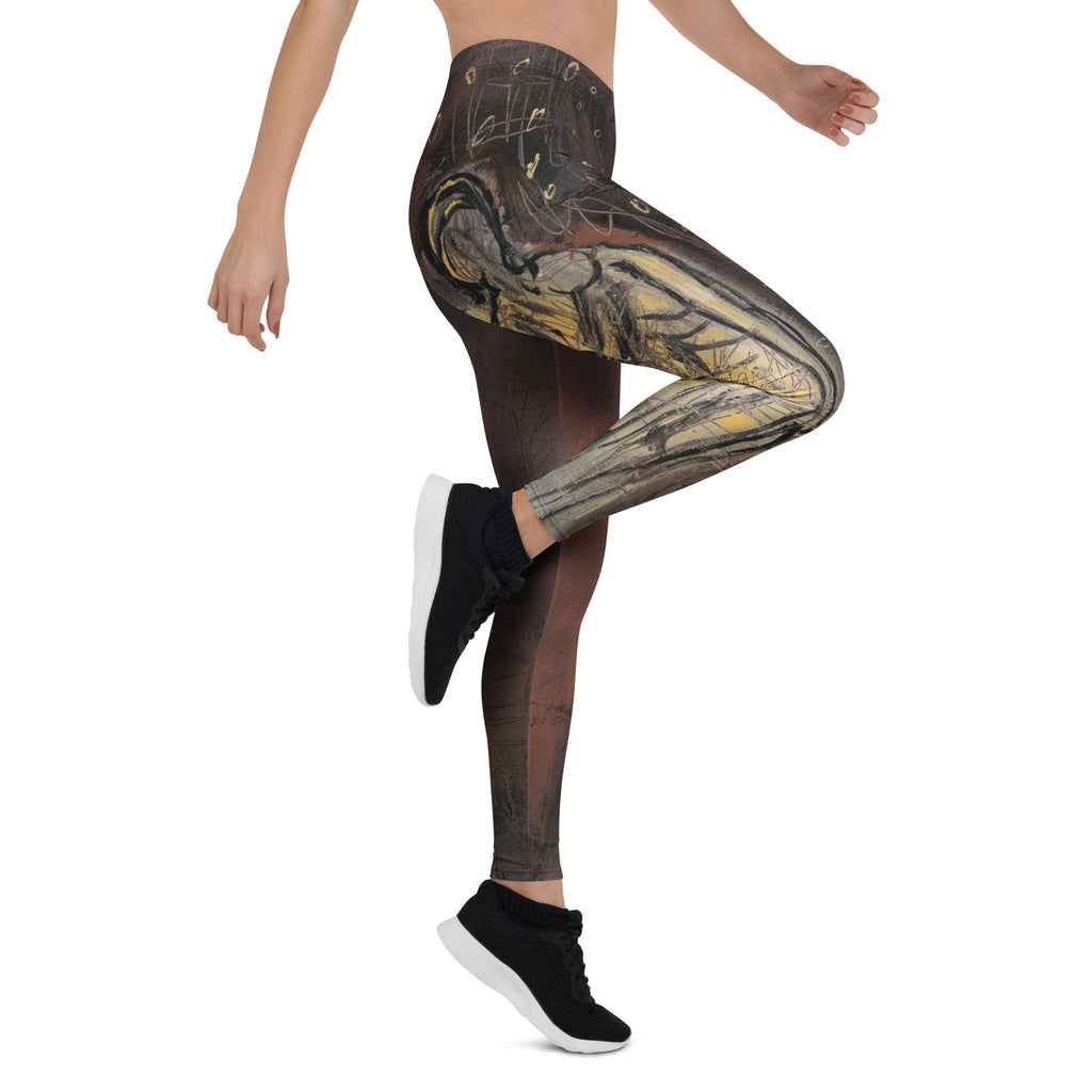 Model raising the other knee, the gold sketched figure wrapping across the thigh