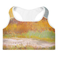 Flat front of the sports bra with the words Following the sun on a pale band, FOLLOWING THE SUN by Klara Chavarría