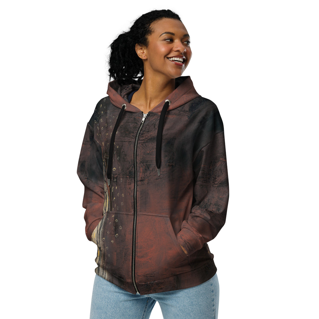 Smiling model with hands in the pockets of the zipped rust hoodie with black drawstrings