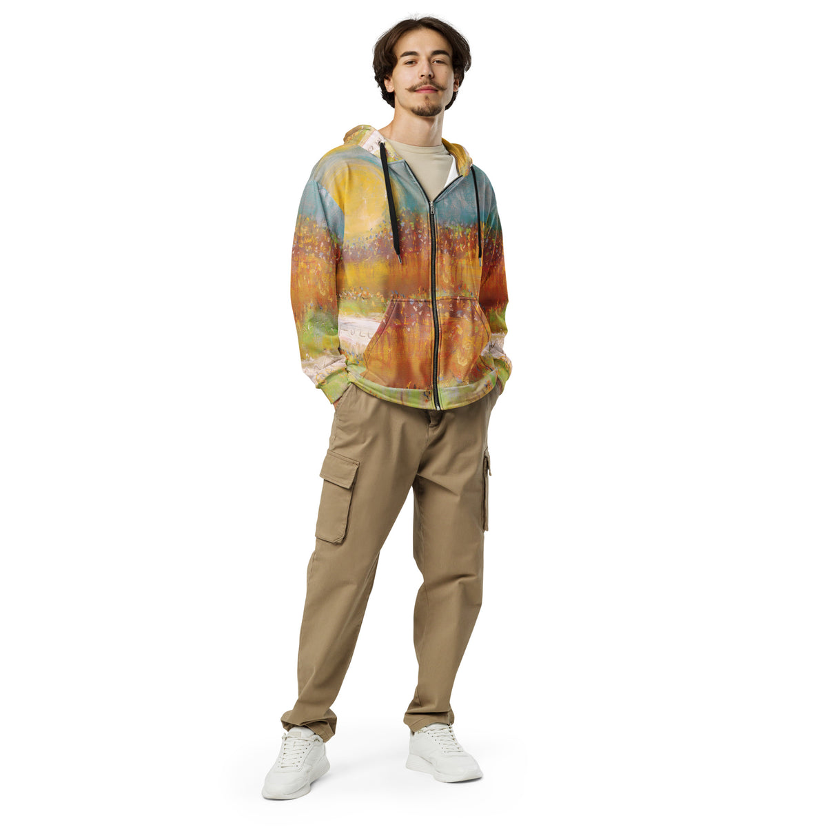 Model wearing the FOLLOWING THE SUN zip hoodie by Klara Chavarría with khaki cargo pants and white sneakers