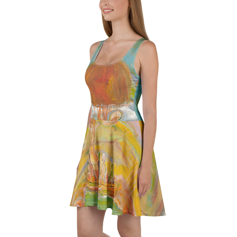 Side view of model showing the orange sun on the bodice and gold swirls on the flared skirt
