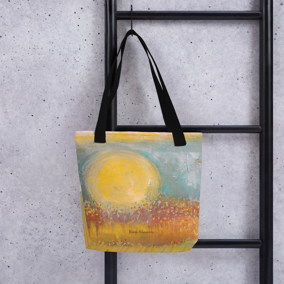 FOLLOWING THE SUN tote bag in Black – front on a ladder