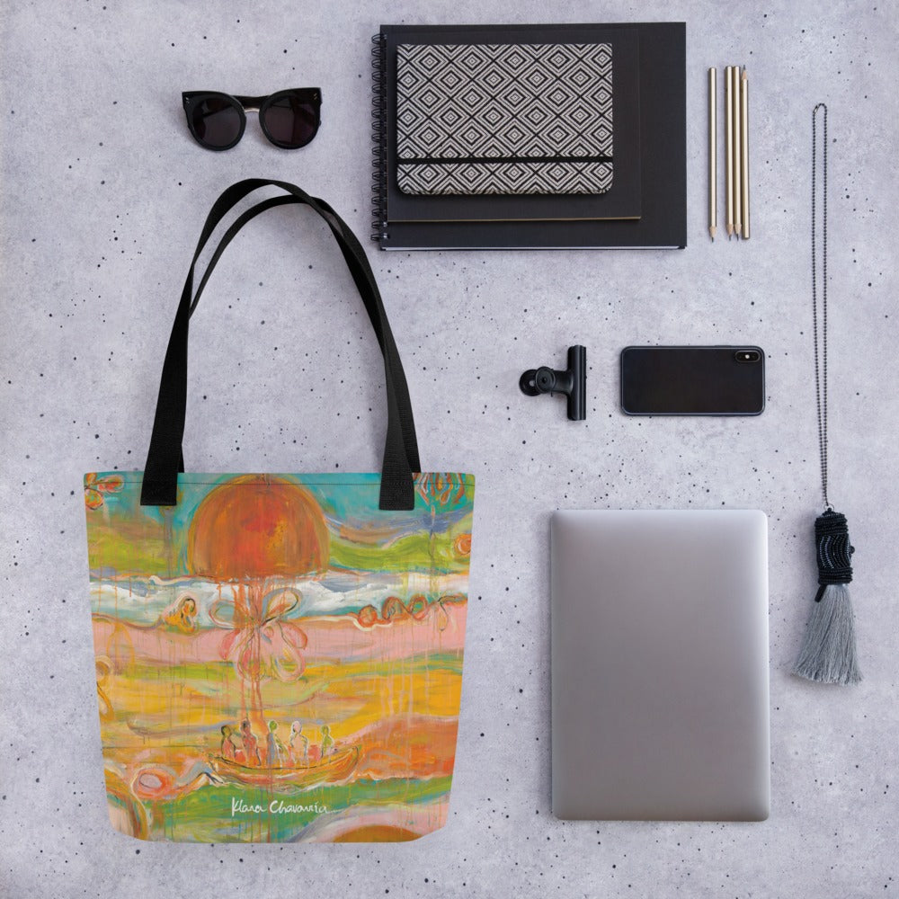 GARDEN OF ILLUSIONS art tote bag with Black handles – flat-lay with sunglasses and laptop – front