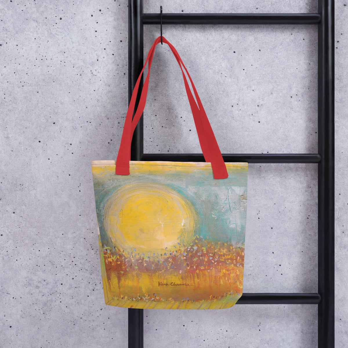 FOLLOWING THE SUN tote bag in Red – front on a ladder