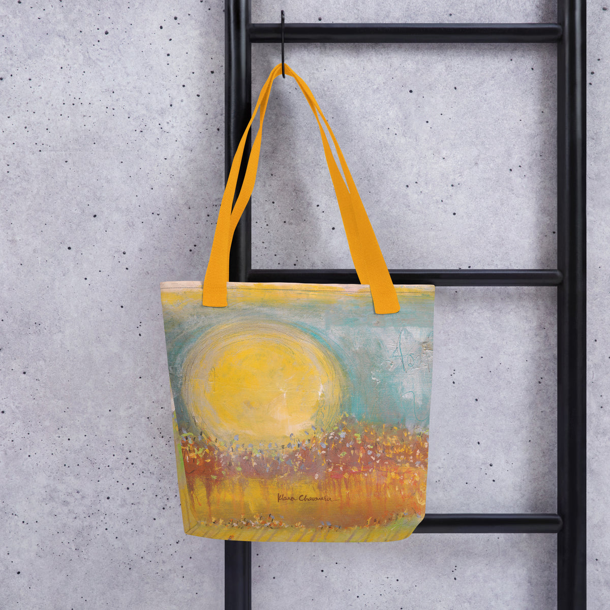 FOLLOWING THE SUN tote bag in Yellow – front on a ladder
