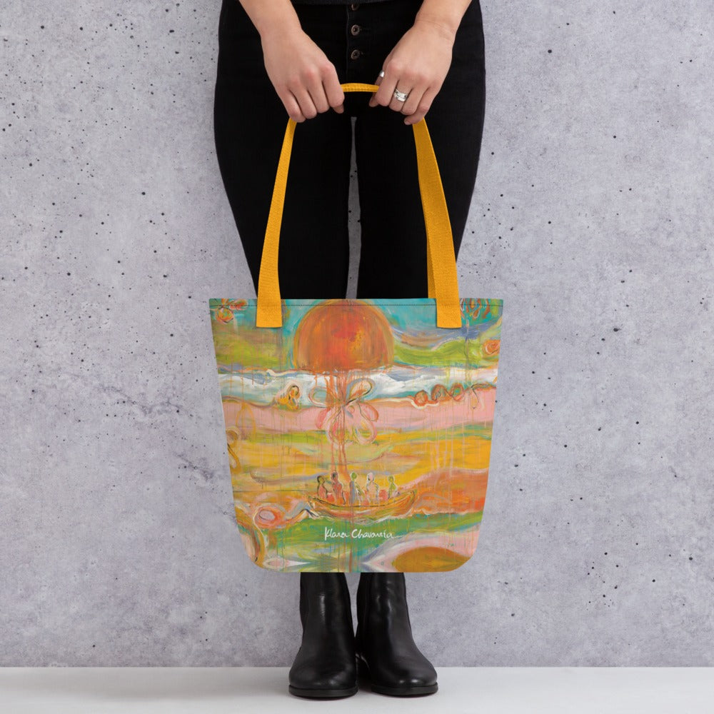 GARDEN OF ILLUSIONS art tote bag with Yellow handles – held in hand, close-up