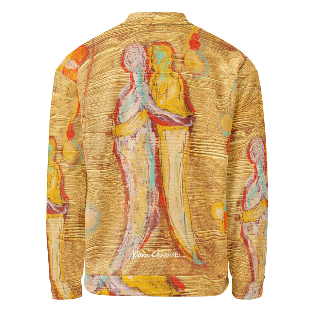 Flat back of the gold bomber with two embracing figures and a white signature at the hem