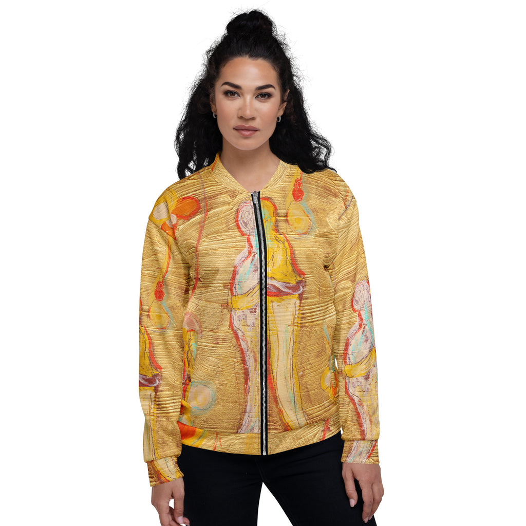 Model with curly hair in a top bun wearing the zipped gold bomber with black pants