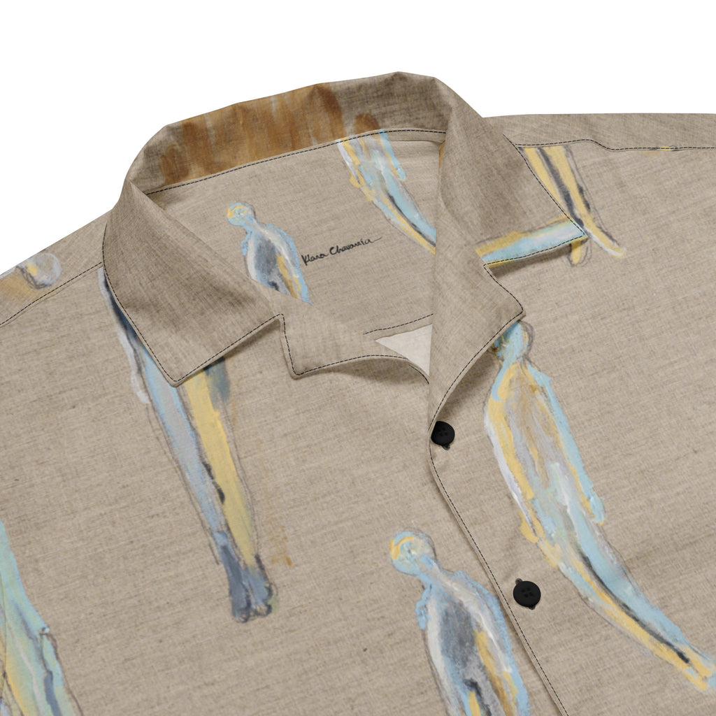 Close-up of the collar and black buttons with a small signature and pale figures