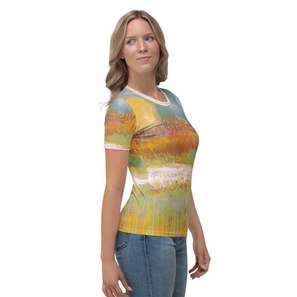 Model in side view glancing over her shoulder, handwritten Following on a pale band of the tee