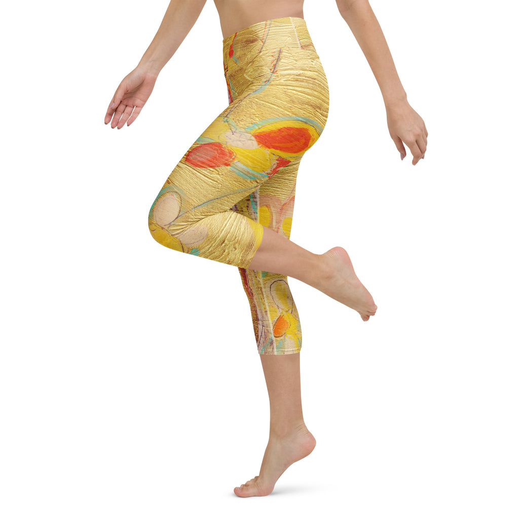 Barefoot model lifting one leg, orange petals across the thigh