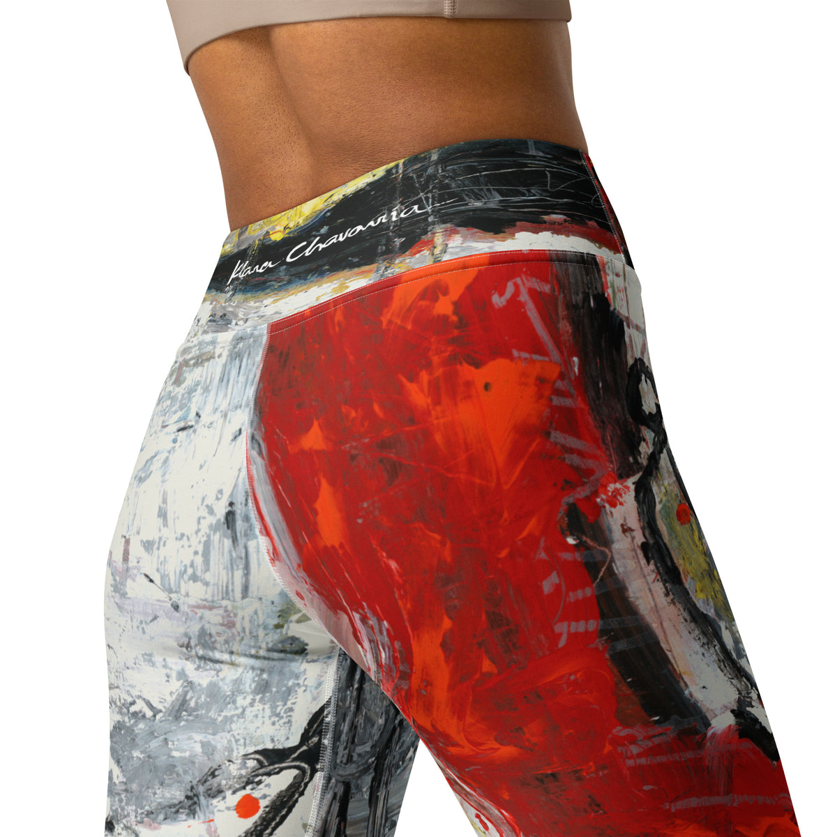 Close-up of the back waistband with white signature above bold red paint