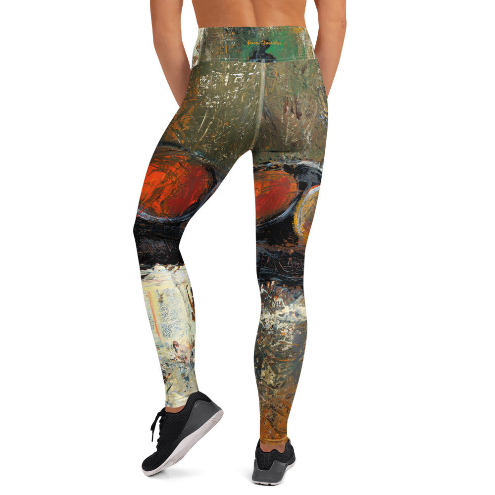 Back view of the high-waist leggings with a small signature on the waistband and orange circles