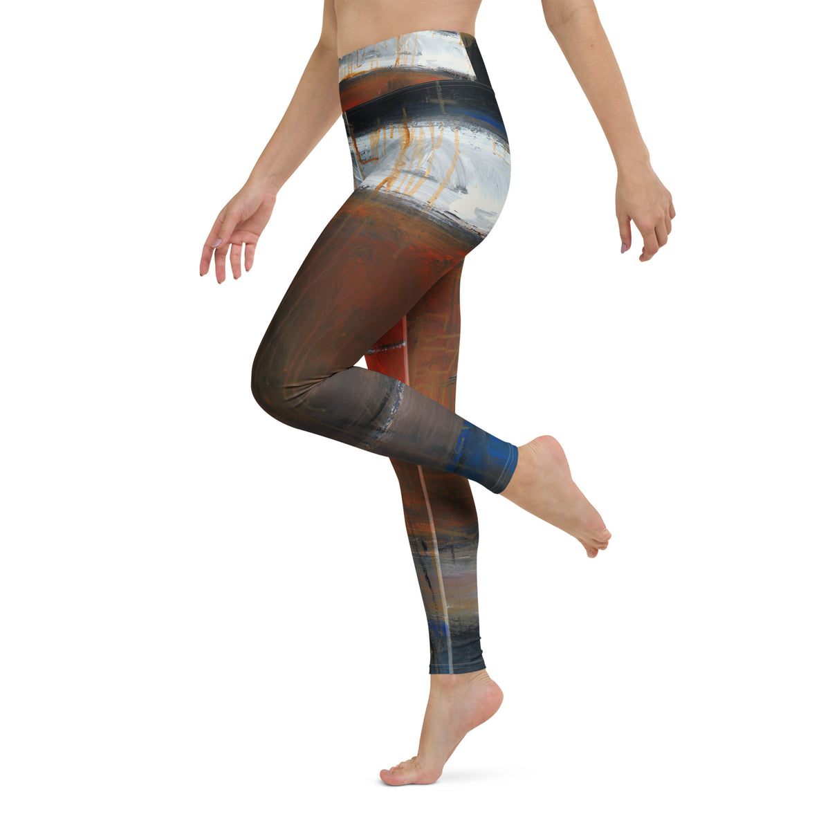 Side view of model kicking one foot back, brown leg ending in a cobalt blue band