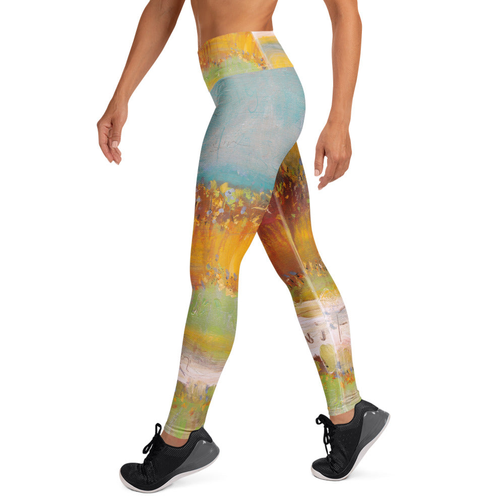 Right side of the leggings mid-stride, teal hip over orange flowers and green at the calf