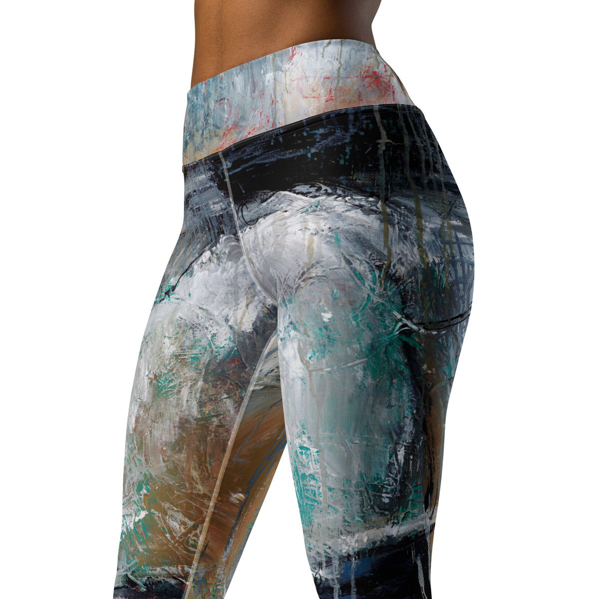 Close-up three-quarter view of the hip and thigh showing white and teal brushwork