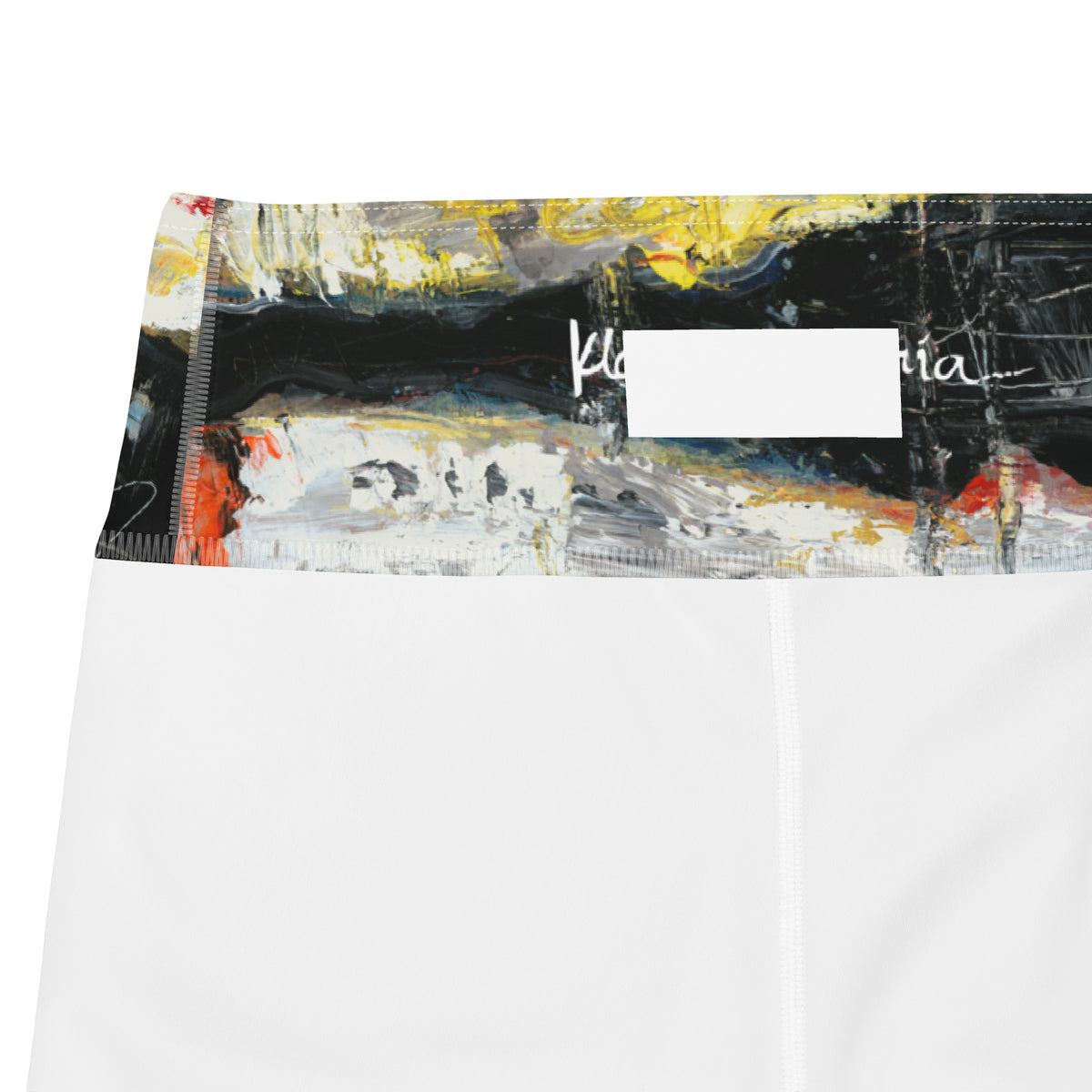 Close-up of the abstract waistband on a white inner lining with a blank white label