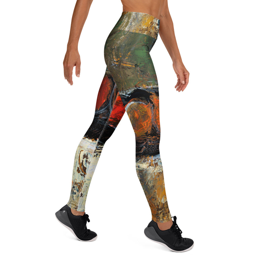 Left side view of the leggings in a walking pose, red and orange shapes across the thigh