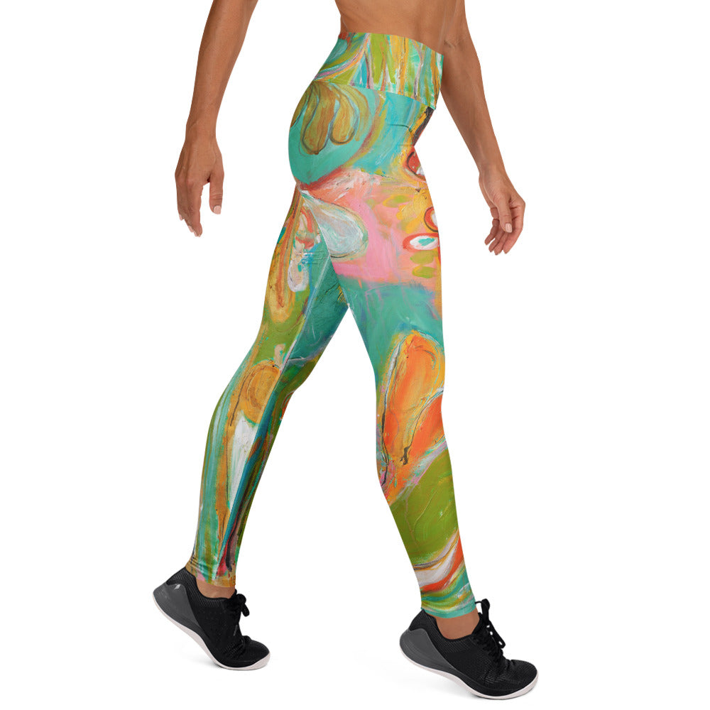 Other side view of model mid-stride, pink, turquoise and orange brushwork on the leg