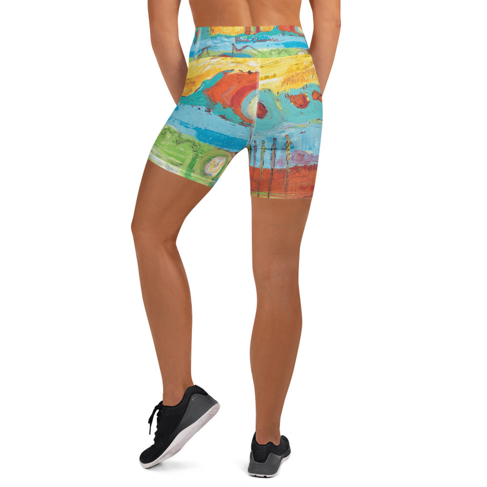 Back view of the yoga shorts with a small signature on the waistband and thin standing figures