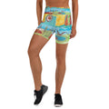 Front of high-waist yoga shorts in turquoise, yellow and green with a red spiral, FIELD OF DREAMS by Klara Chavarría