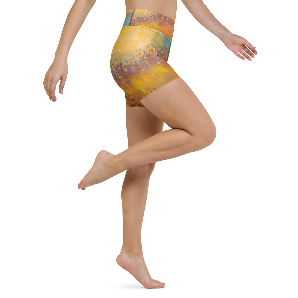 FOLLOWING THE SUN PART I art yoga shorts – opposite side view on model, knee raised