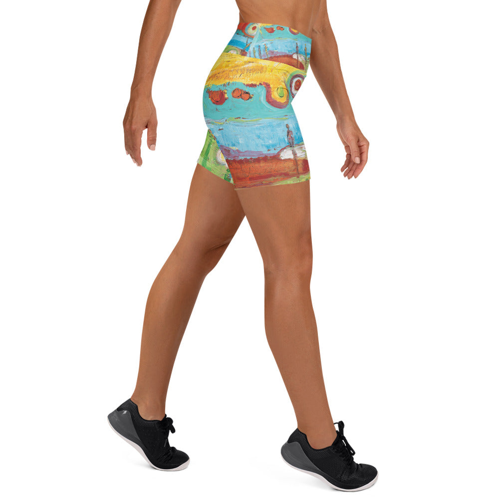 Left side view of the shorts in a walking pose, orange dots and a lone thin figure