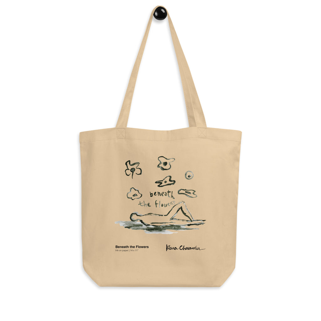 BENEATH THE FLOWERS Eco Tote Bag – Oyster – hanging on a wall hook