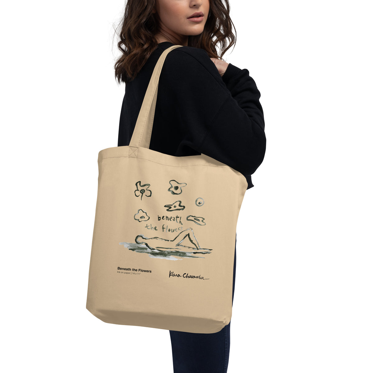 BENEATH THE FLOWERS Eco Tote Bag – Oyster – carried on the shoulder by a model