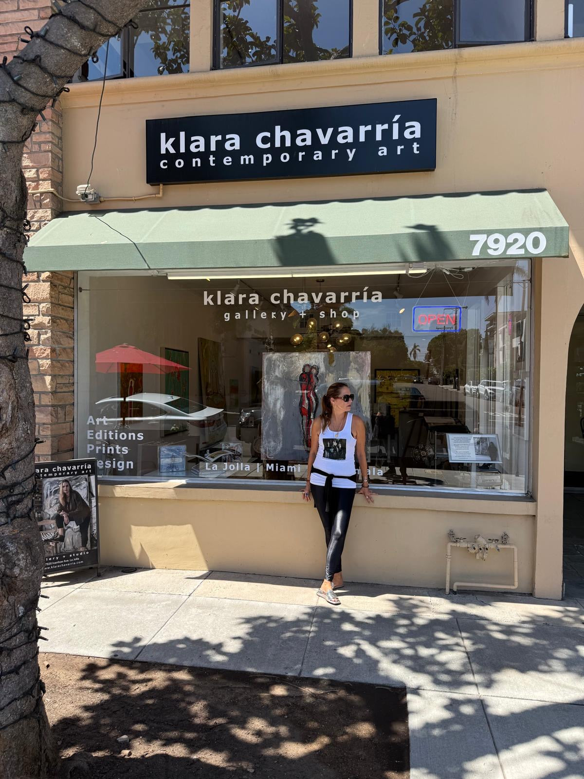 Klara Chavarría standing in front of her contemporary art gallery in La Jolla, California