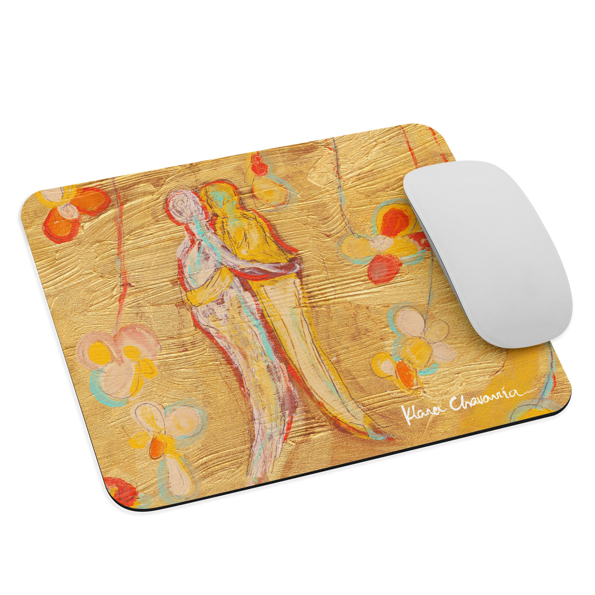 Angled view of the gold mouse pad with a white mouse on the right and a white signature in the corner