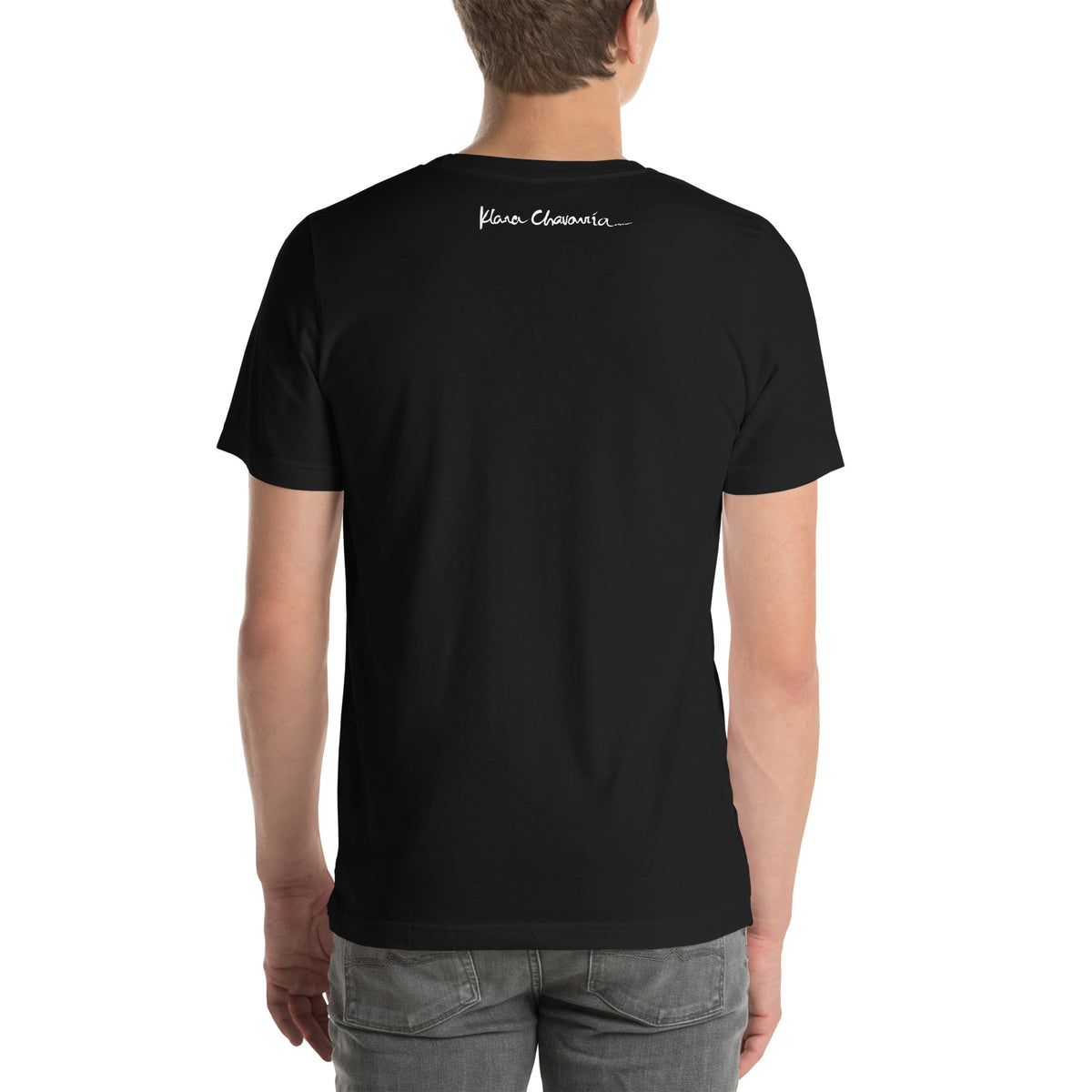 Model from behind in the black tee and gray jeans, white signature below the collar